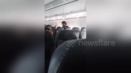 Rude plane passengers get angry as they are not let off the aircraft first