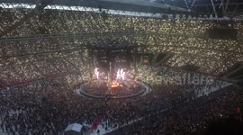 Fans light up stadium with phones in support of Grenfell victims