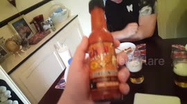 Two men eat worlds hottest peanuts in extremely hot chilli sauce ***eaten like cereal***