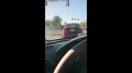 Man jumps out of car to close woman's open petrol cap