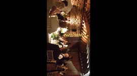 Secret opera singers at wedding