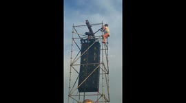 Crazy concert girl climbs a tower