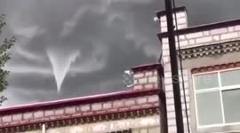 Tornado spotted over town in southwestern China
