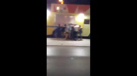 Crazy Street fight in San Antonio, Tx(look at all the shoes)