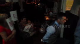 Romantic proposal with everyone involved