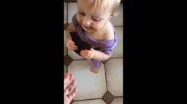 Baby girl steals chocolate and won't give it back