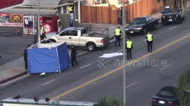 Body on Beverly Gets Covered by Police