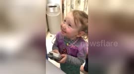 Girl, 2, is delighted to hear her baby sister's heartbeat