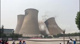 Four cooling towers demolished in China