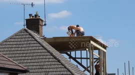 Workmen in Blazing Hot Sunny Heat on Roof