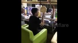 Addict gamer hangs food by computer so he can keep playing
