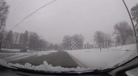 Jeep cutting a line of cars off in bad weather at Coventry and Fairmont