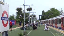 People arrive by the tube to the Wimbledon Champiponship in London