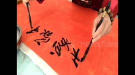 Man shows off his amazing calligraphy skills