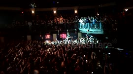 Foo Fighters Dave Grohl plays on bar, takes shot of Jager. 9:30 club