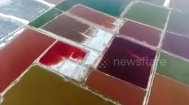 Aerial footage of colourful salt lake in northern China