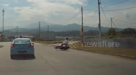 Downed power lines cause motorcycle rider to fall