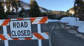 Californian mountain road covered in snow despite heat wave