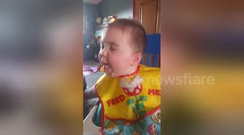Baby makes weird face and sounds as she finds apples way too sour