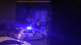 Police attend the scene of an 'acid attack' in Hackney