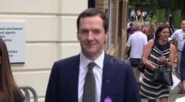 George Osborne and Cliff Richard at Wimbledon on semi-final day