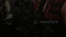 HARDCORE Pro Wrestlers engage in a fight that goes into the crowd!