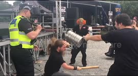 Now that's head-banging! Moshing UK metal fan whacks himself in head