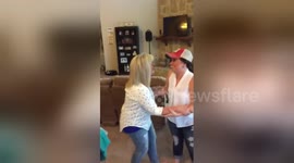 Daughter surprises parents with baby announcement