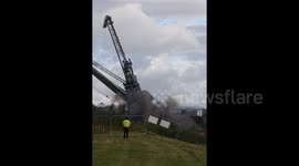 Cranes in UK demolished by controlled explosions