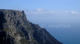 Snow falls on Table Mountain, Cape Town