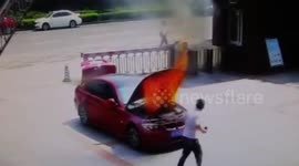 Man drives afire car into fire station