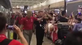 Arsenal squad receive rapturous reception after arriving in Shanghai