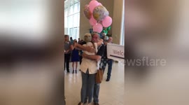 Woman meets biological father for the first time