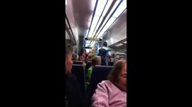 Crazy Couple Fighting On London Charing Cross train.