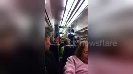 Newsflare Edit - Crazy Couple Fighting On London Charing Cross train.