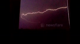 Lightning strikes over north London