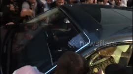 McGregor fans mob Mayweather's car and clash with his body guards