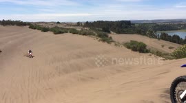 Motocross jump fail in sand dunes
