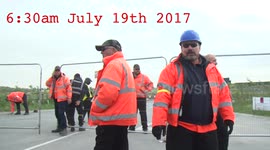 Security guard locks on to Fracking protesters