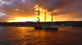 Drone Footage Of Tall Ship In Stunning Storm Sunset Sky!