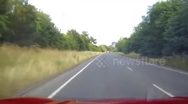 Hot Air Balloon crossing busy road near Market Harborough