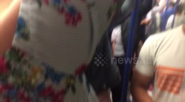 Packed in on a tube on the underground