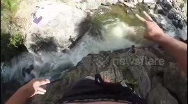 Cliff jumping into tiny pool
