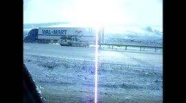 Tractor Trailer Jack-Knifes On Snowy Interstate