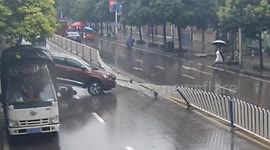 Out-of-control car knocks down two people on scooter in China