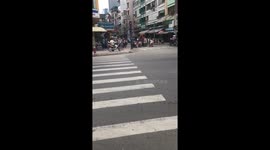 Crossing the road in Vietnam