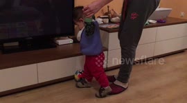 Martin is playing with a ball
