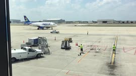 Spirit Airlines arrives at Detroit Metro Airport gate