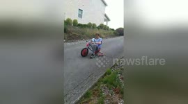 Newsflare Edit - Amazing hook shot while riding a kids trike  !!