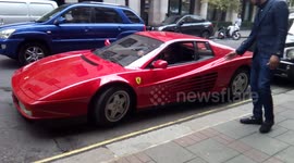 Ferrari driver has difficulty parking supercar outside hotel in Green park